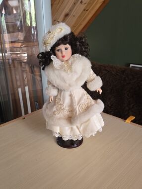 Classic Porcelain Doll in Cream Fur Coat and Hat